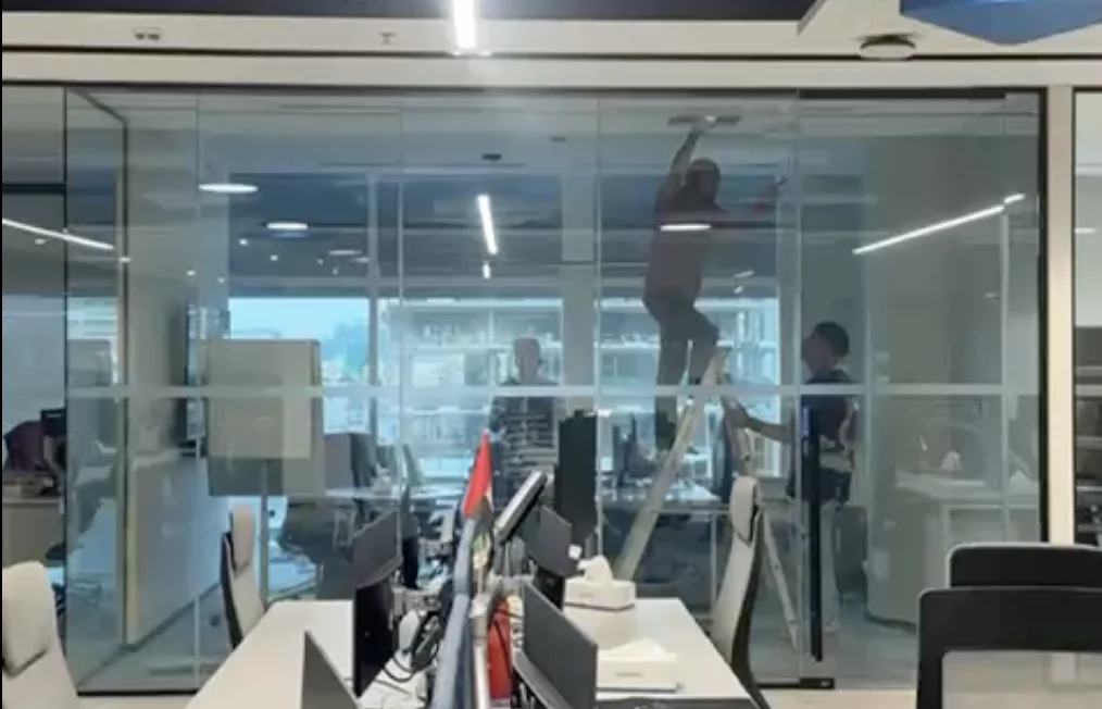 Smart film ON — clear glass — transparent office view